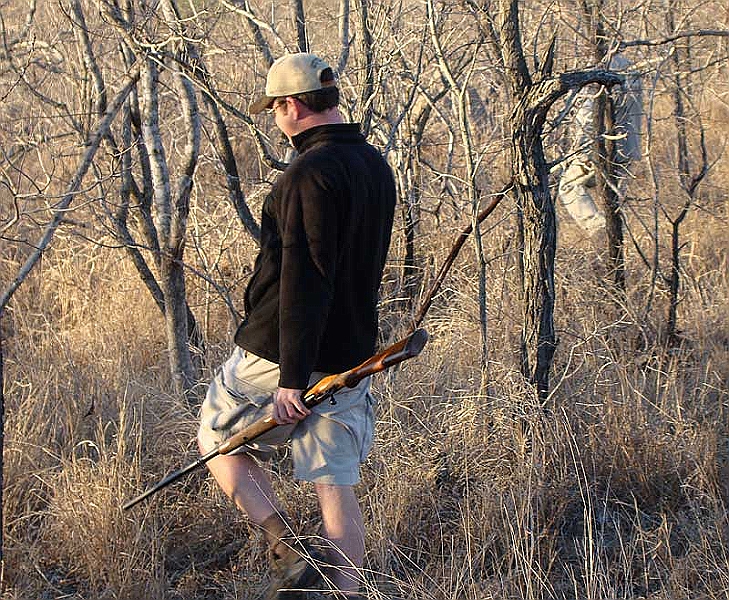 lhtrack2.jpg - When Gary went off alone to track he took his gun.. I mean his rifle.  The funny thing is that our tracker never took a rifle.