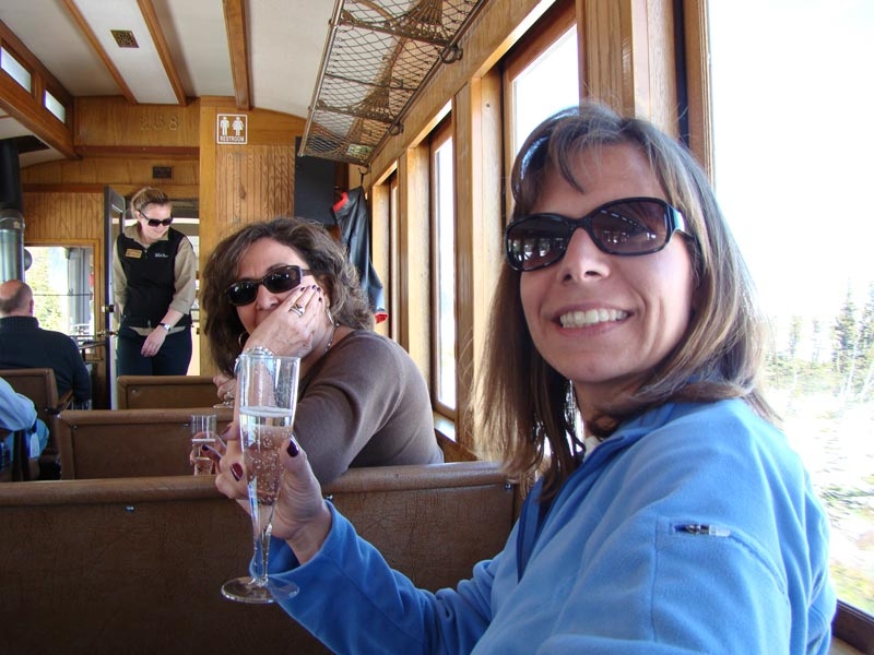 rail2.jpg - Tonya sips on some champagne as we cross the summit on the historic railroad.