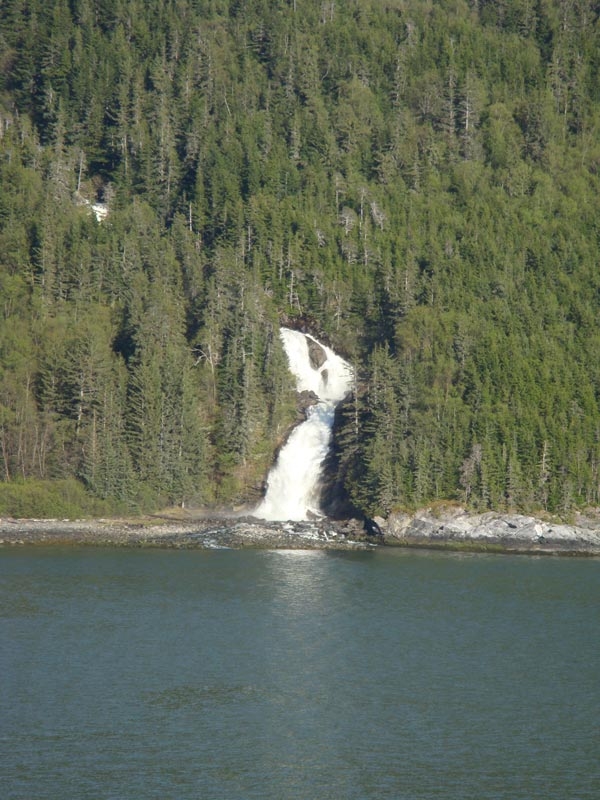 swsail2.jpg - A roaring waterfall as we sail out of Skagway.